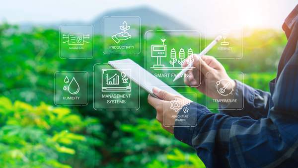 person using a tablet for smart farming with icons for productivity management systems humidity and temperature in a green agricultural setting focusing on innovative solutions for sustainable farming practices 12 digital tools for success